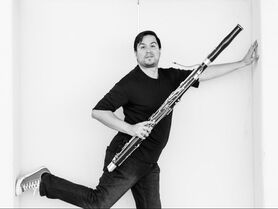 JJ Arévalo and bassoon, photo by Mindi Rey Acosta, FluteloopPhotography